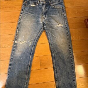 Levi's 505 blue distressed jeans